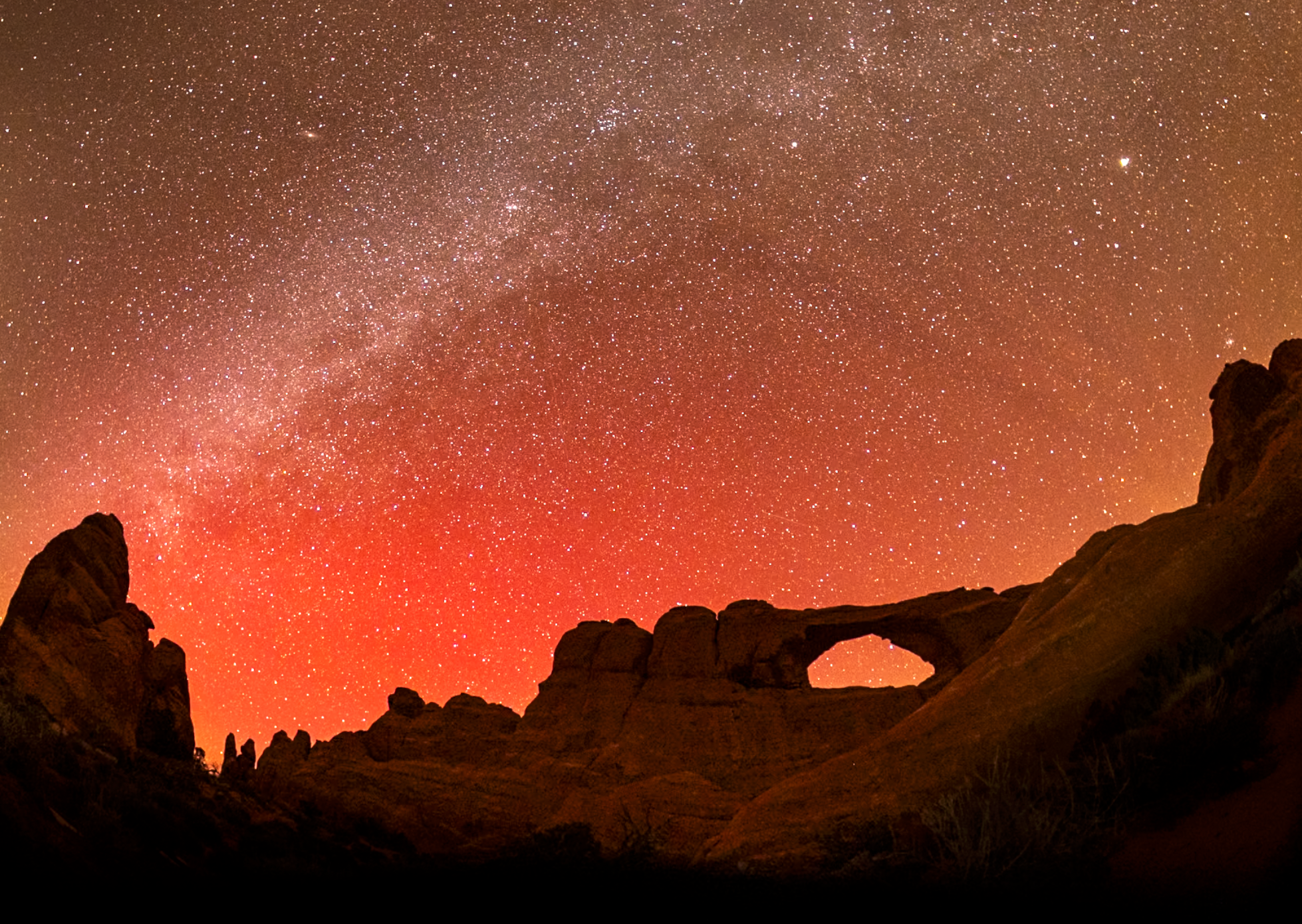 Red Aurora Over Skyline Arch – Arches National Park